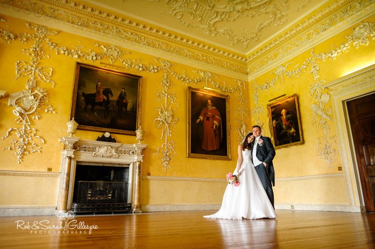 Bride and groom inside beautiful room at Hagley Hall