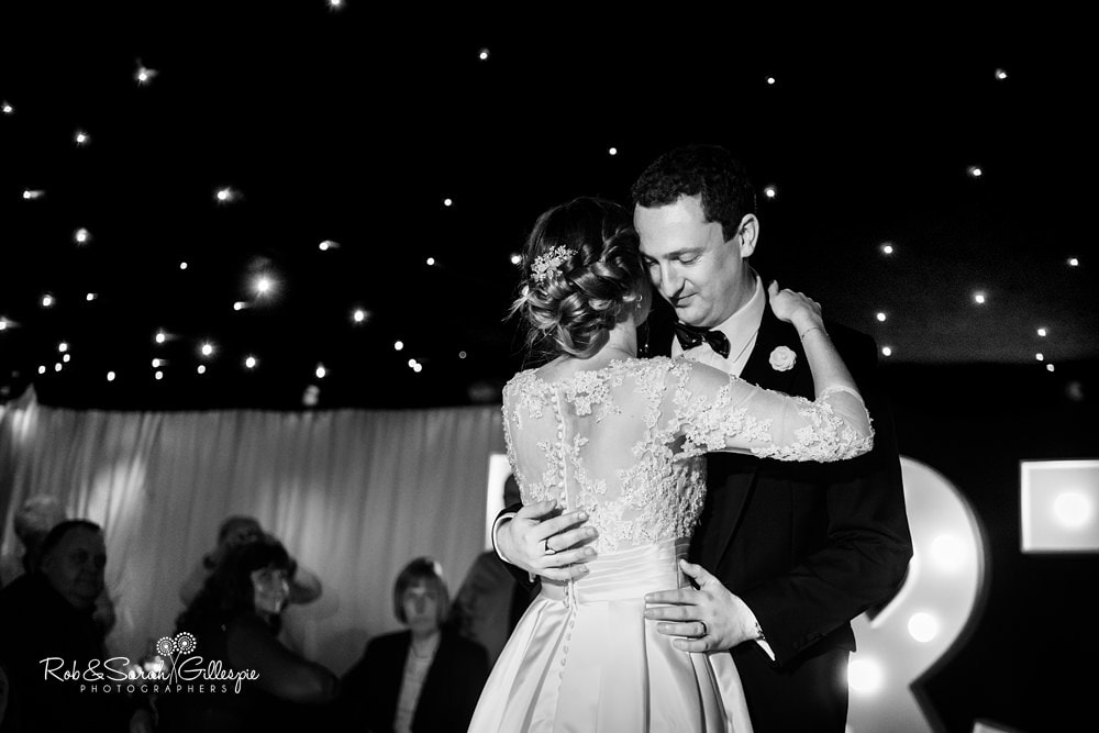Bride, groom and guests dancing at wedding reception at The Boathouse Sutton Coldfield