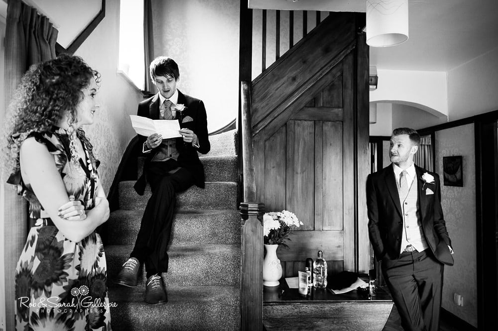 Groom and groomsmen get ready for wedding 
