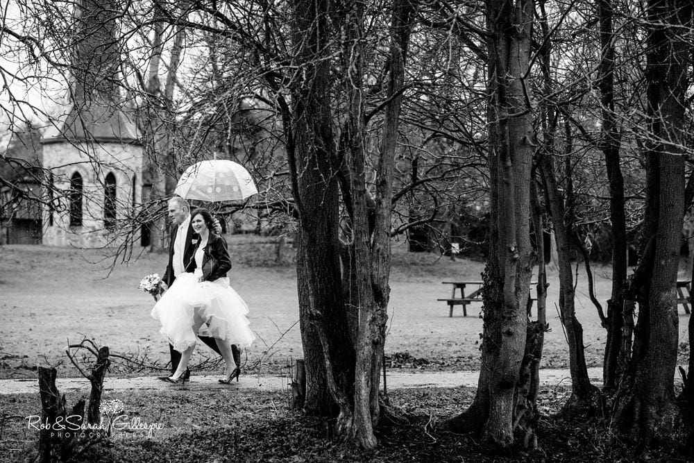 Bride and father walk to wedding blessing at Avoncroft Museum