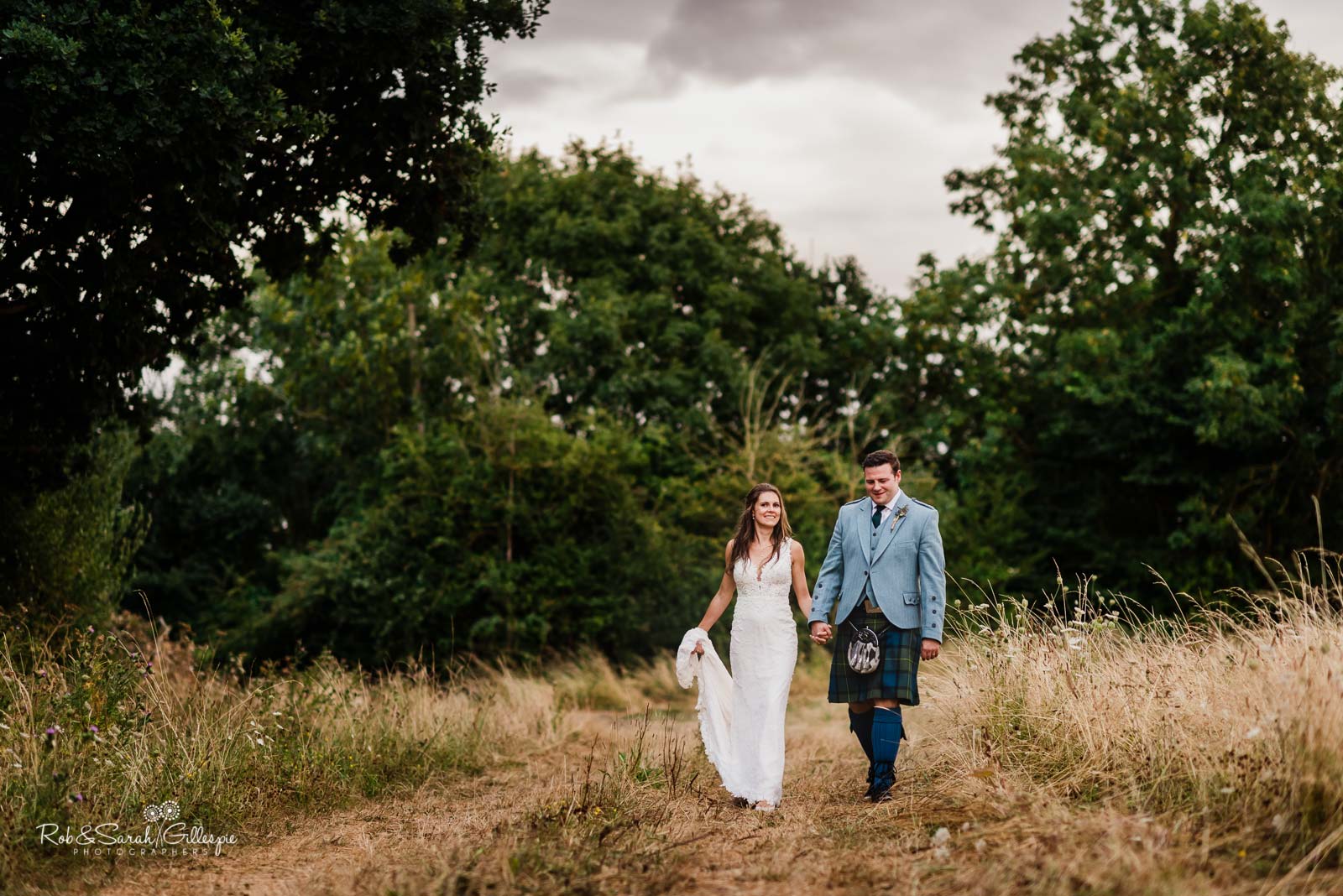 Bride and groom walking together at Wethele Manor