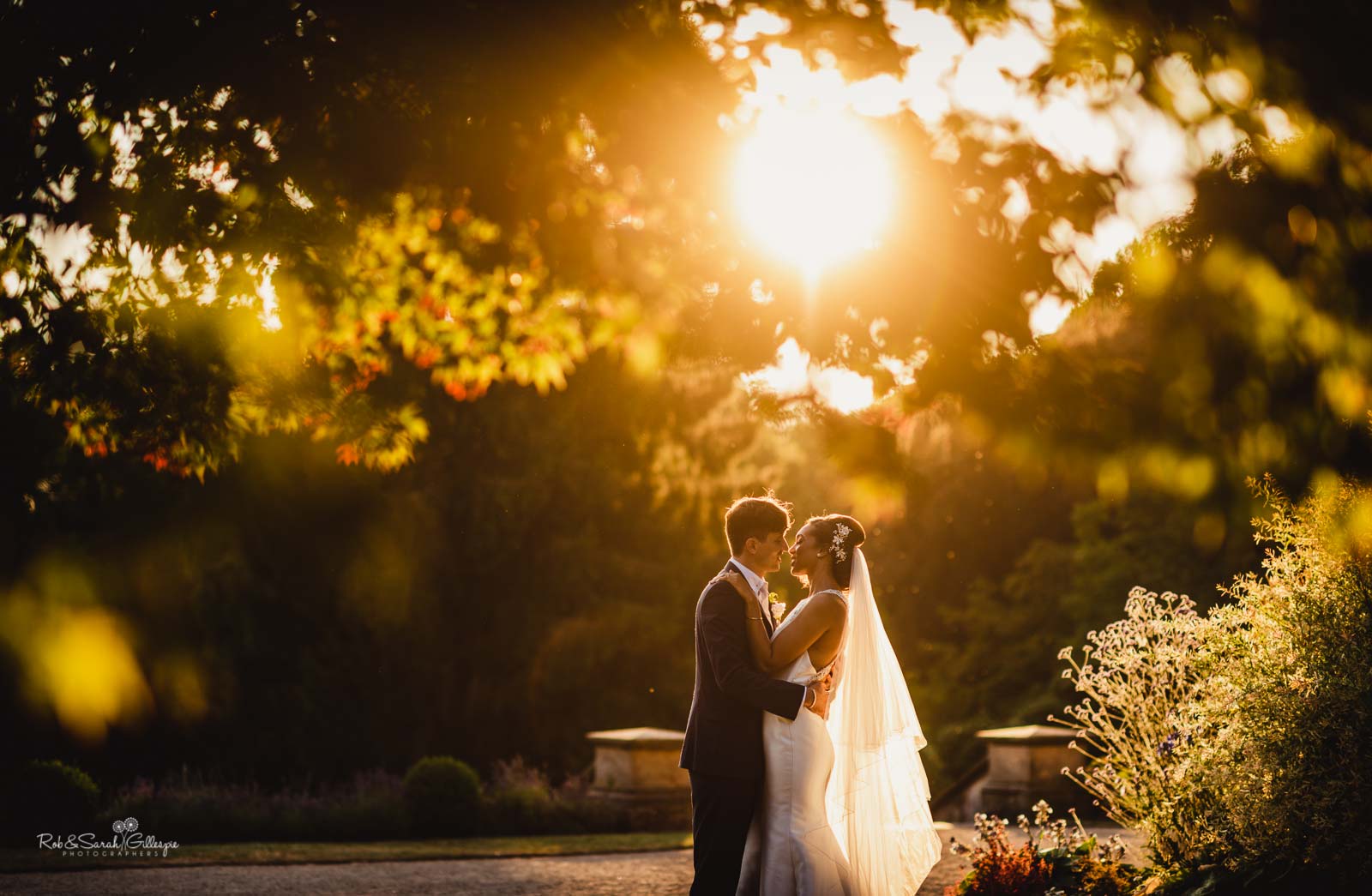 Beautiful photo of bride and groom in evening sunlight at Hampton Manor