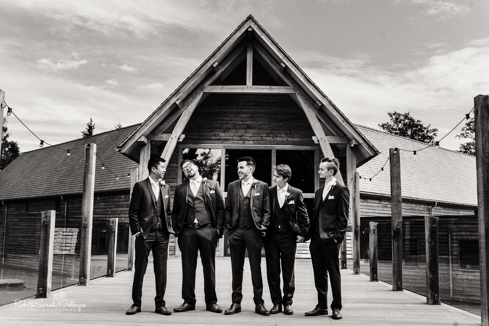 Group photo of groom and ushers at The Mill Barns wedding venue