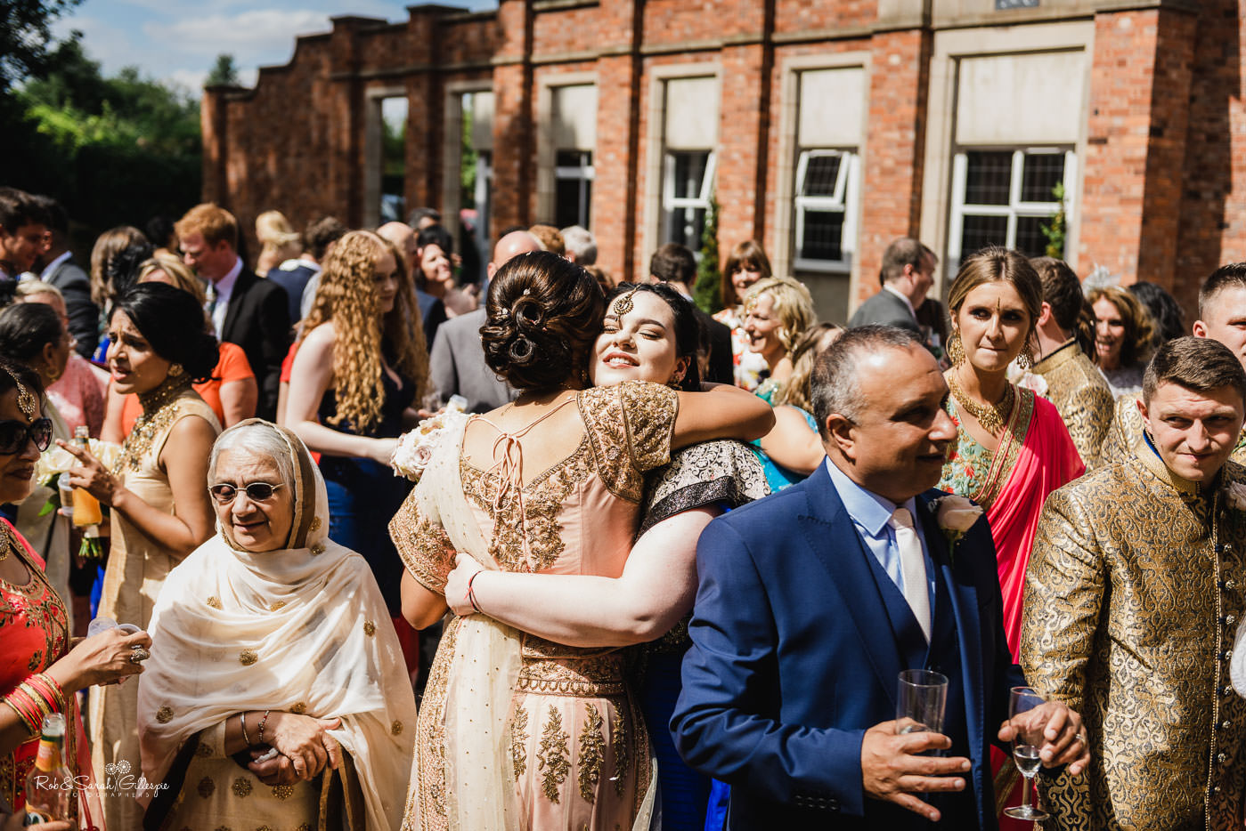 Wedding guests enjoy drinks reception at Pendrell Hall