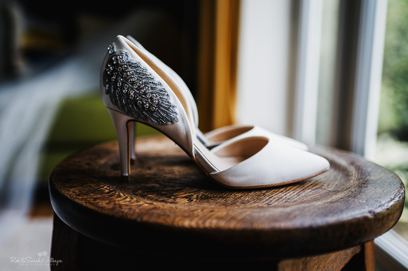 Bridal shoes with intricate feather decoration