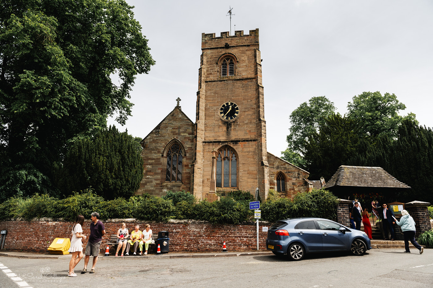 St Leonard's Church in Clent with guests arriving for wedding