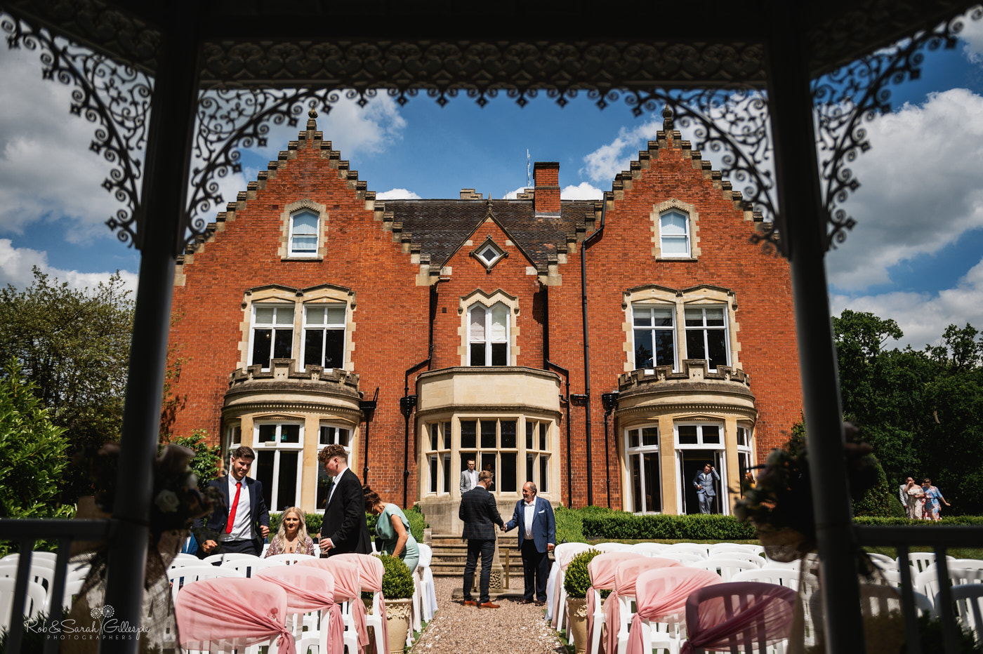 Guests arrive for outdoor wedding at Pendrell Hall