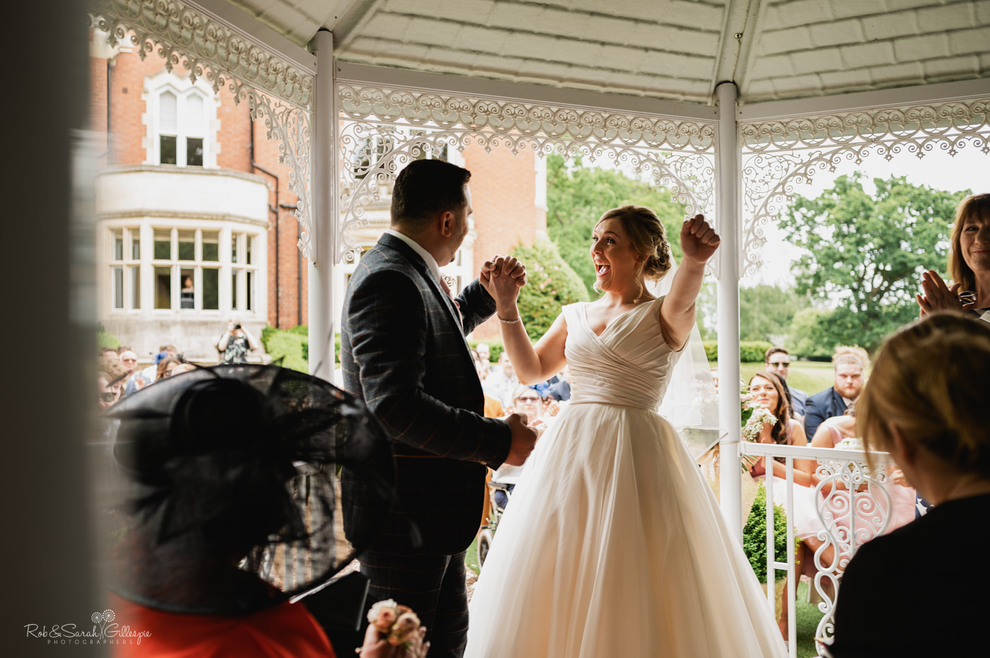 Outdoor wedding ceremony at Pendrell Hall in Staffordshire