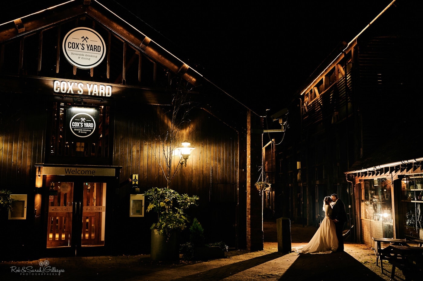 Nighttime photo bride and groom at Cox's Yard in Stratford upon Avon