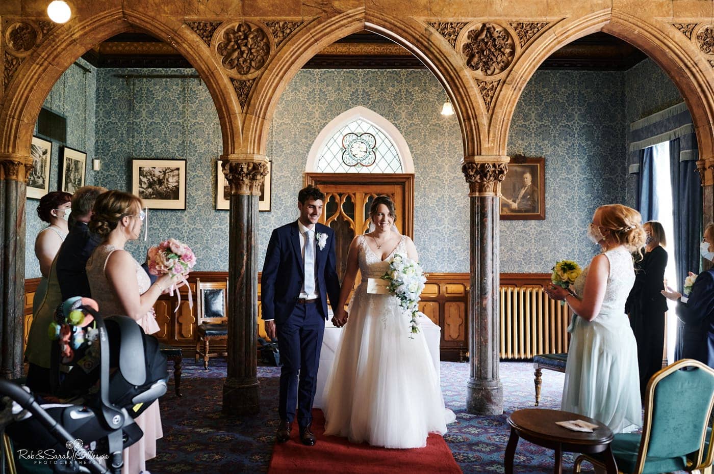 Bride and groom during wedding ceremony at Highbury Hall