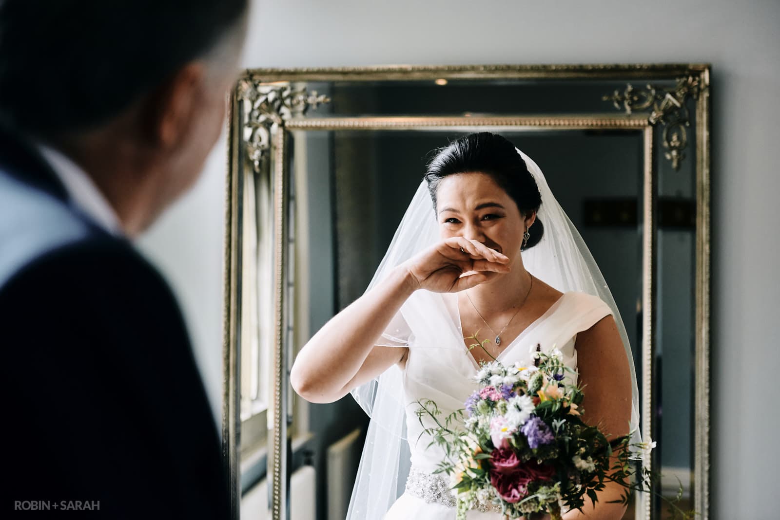 Bride emotional as father sees her in wedding dress