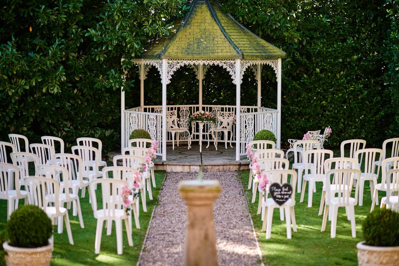 Bandstand and chairs ready for outdoor wedding ceremony at Pendrell Hall
