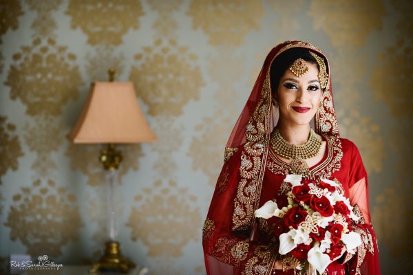 Portrait of bride in red Bengali wedding dress