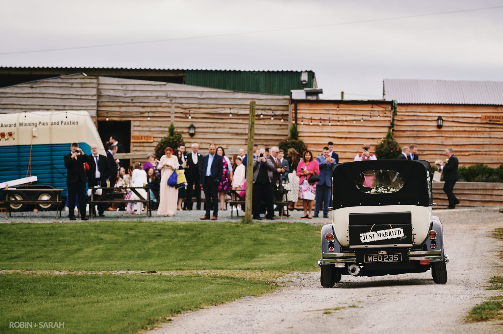 Wedding car arrives at The Barn at Dinthill