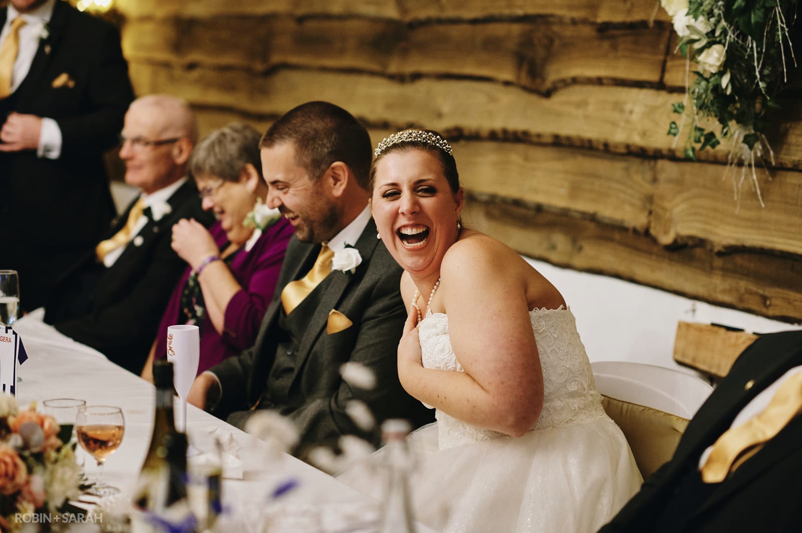 Wedding speeches in wooden barn