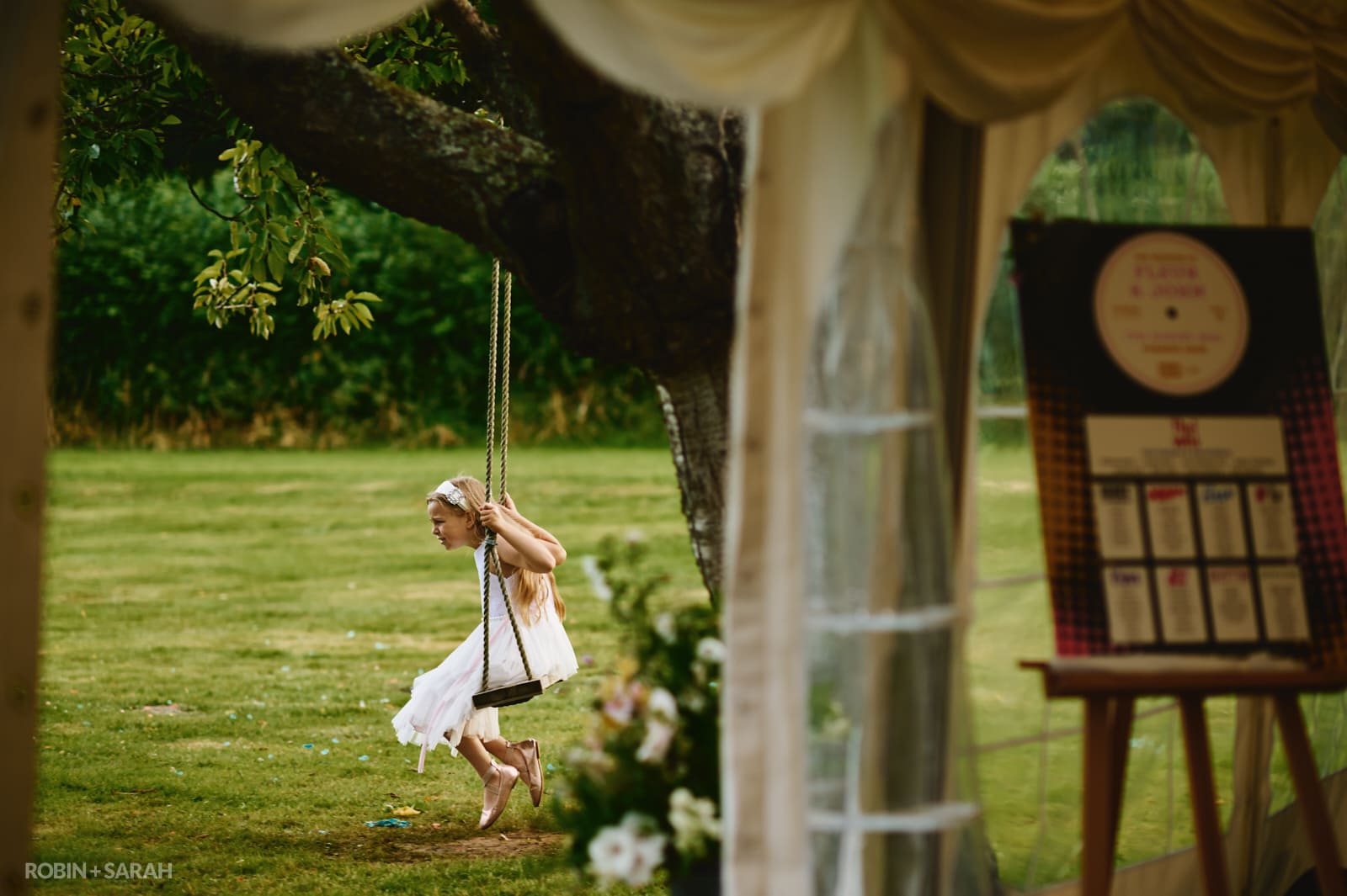 Young girl on rope swing at Forests Edge wedding venue in Worcestershire