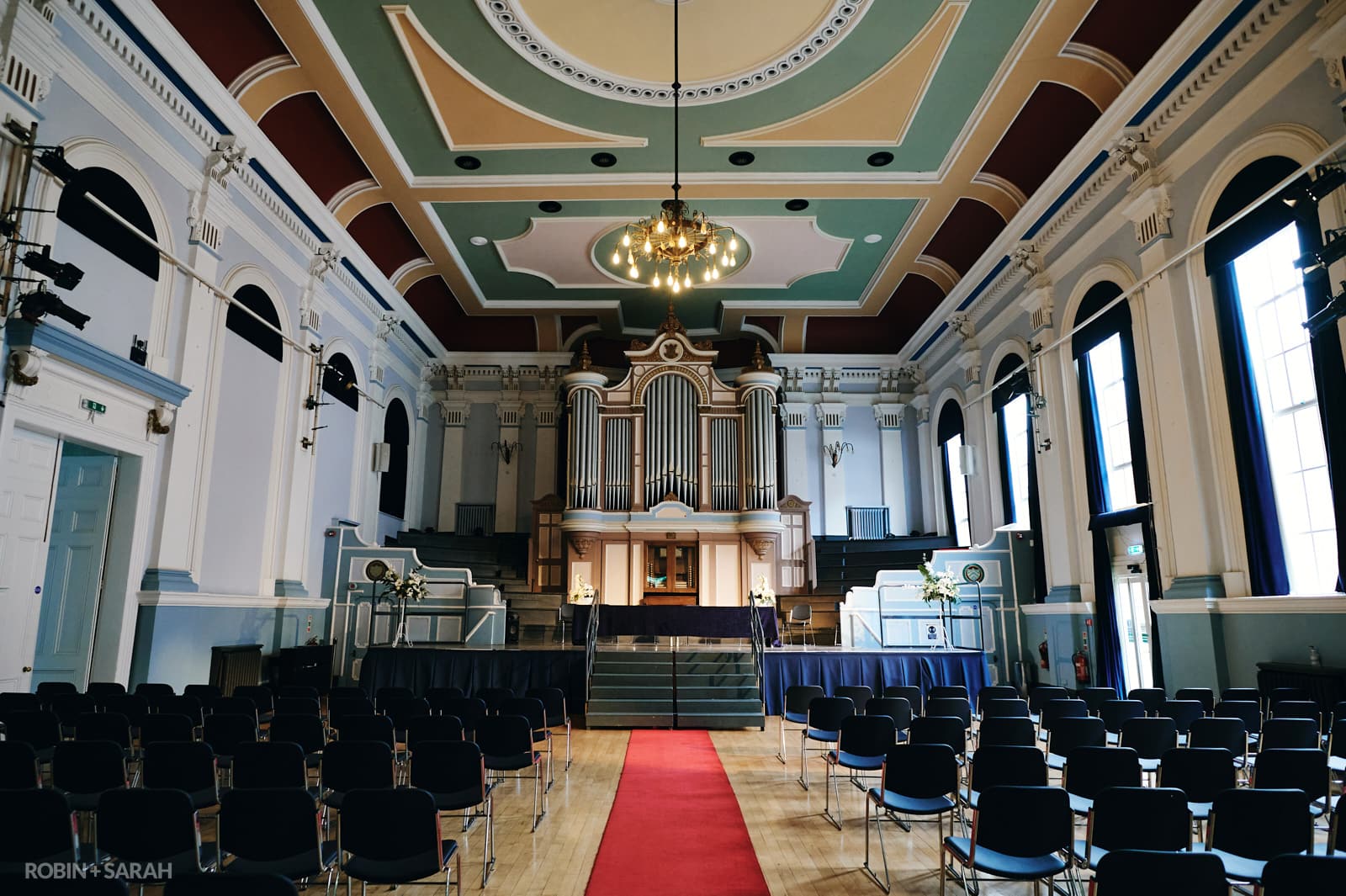 Inside Kidderminster Town Hall with seating laid out for wedding ceremony