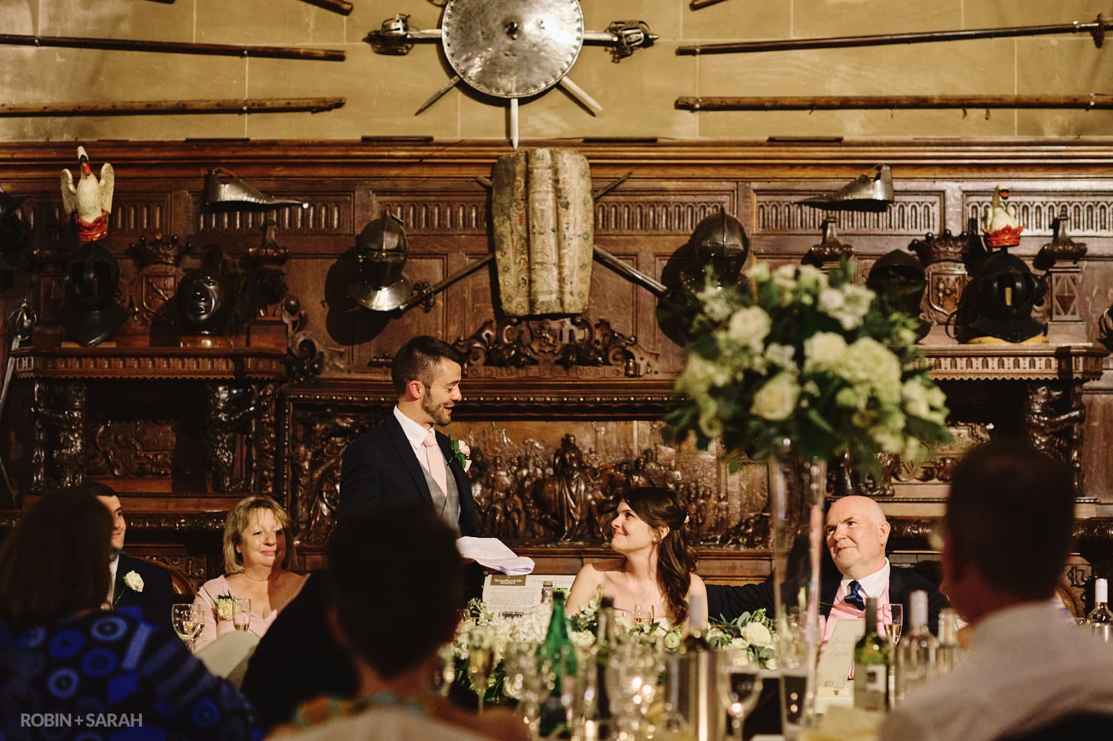 Groom delivers wedding speech in Great Hall at Warwick Castle