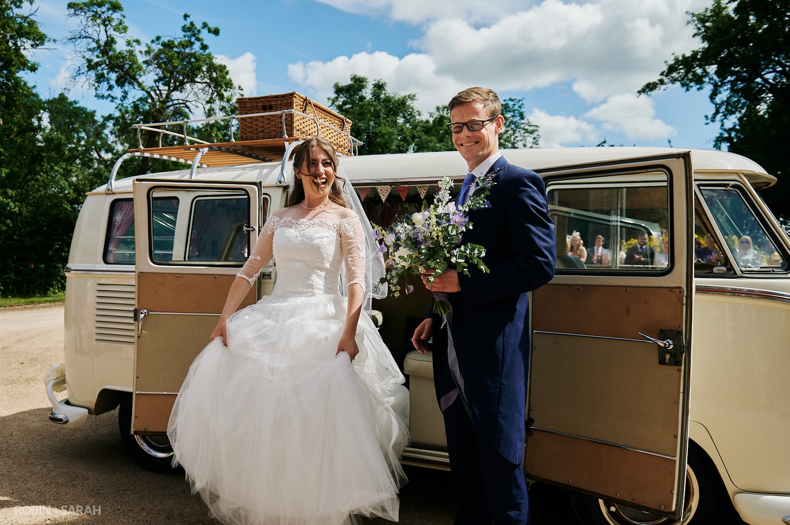 Bride and groom arrive at Wethele Manor in old camper van