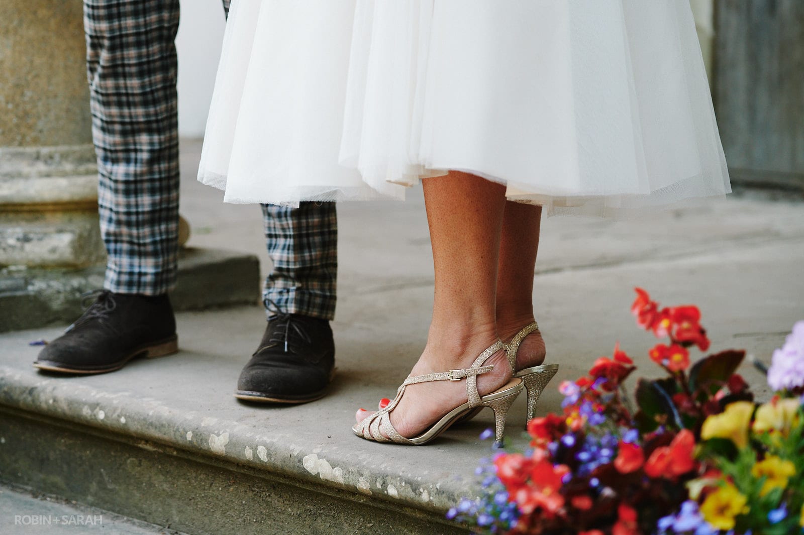 Bride and groom's feet on steps