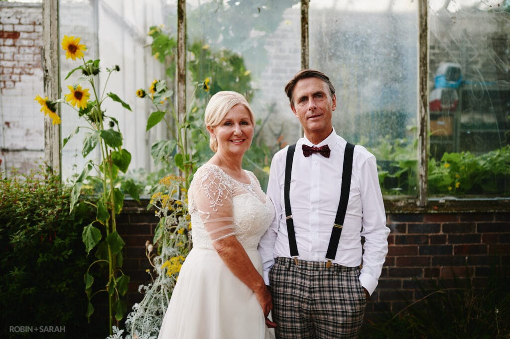 Bride and groom relax at Oakfield Gardens