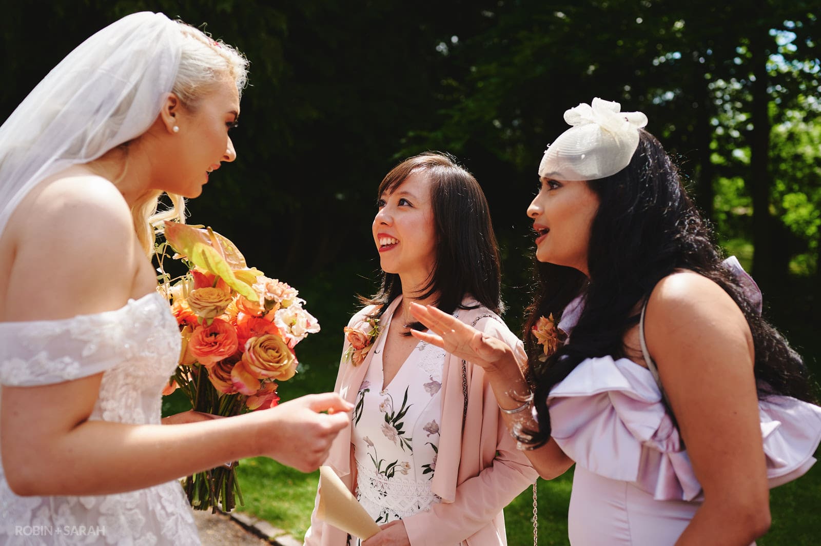 Bride greets wedding guests after church service