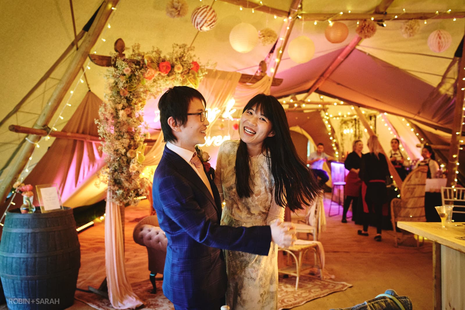 Evening wedding reception party in tipi