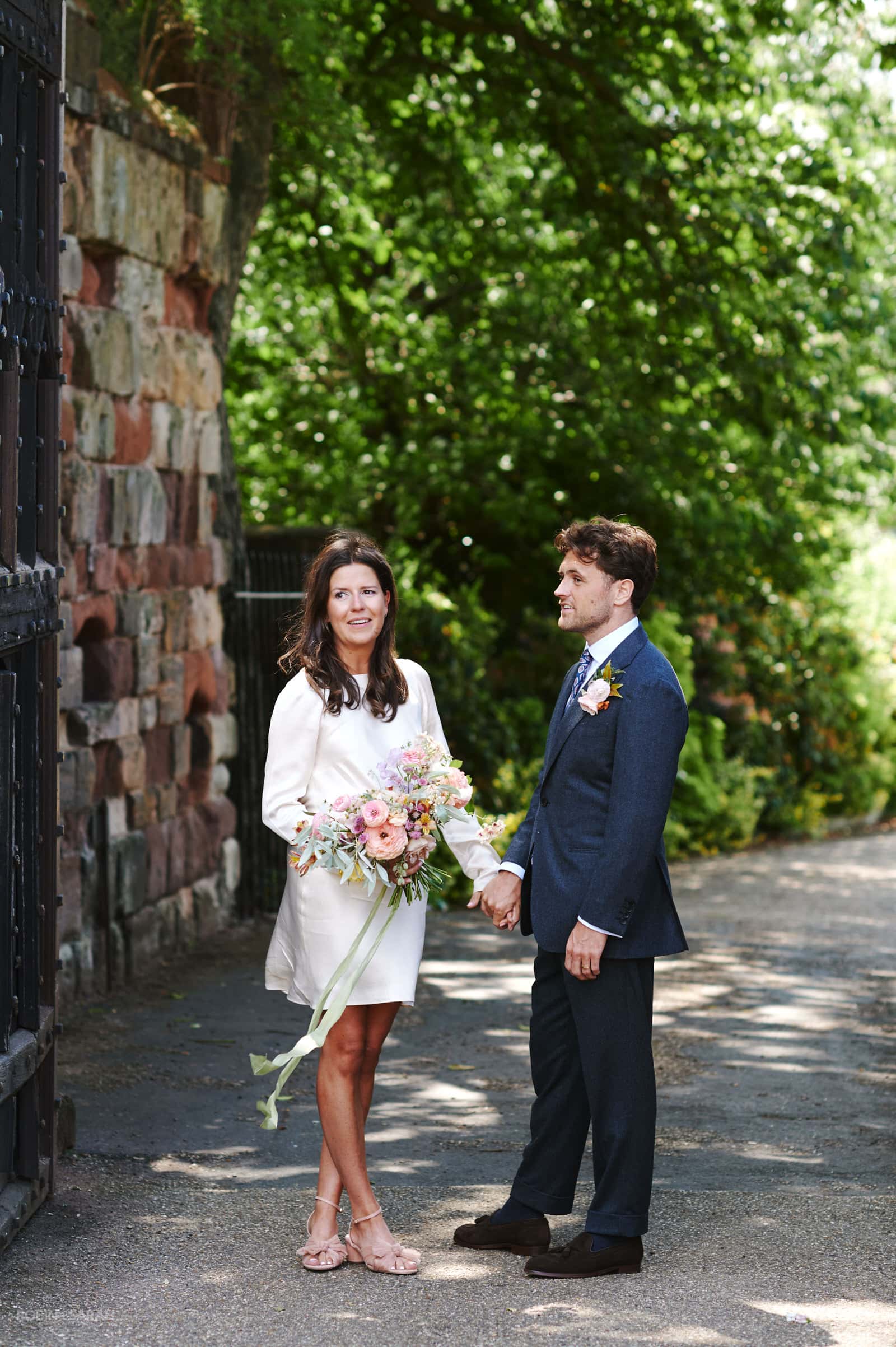 Bride and groom in gateway at Shrewsbury Castle