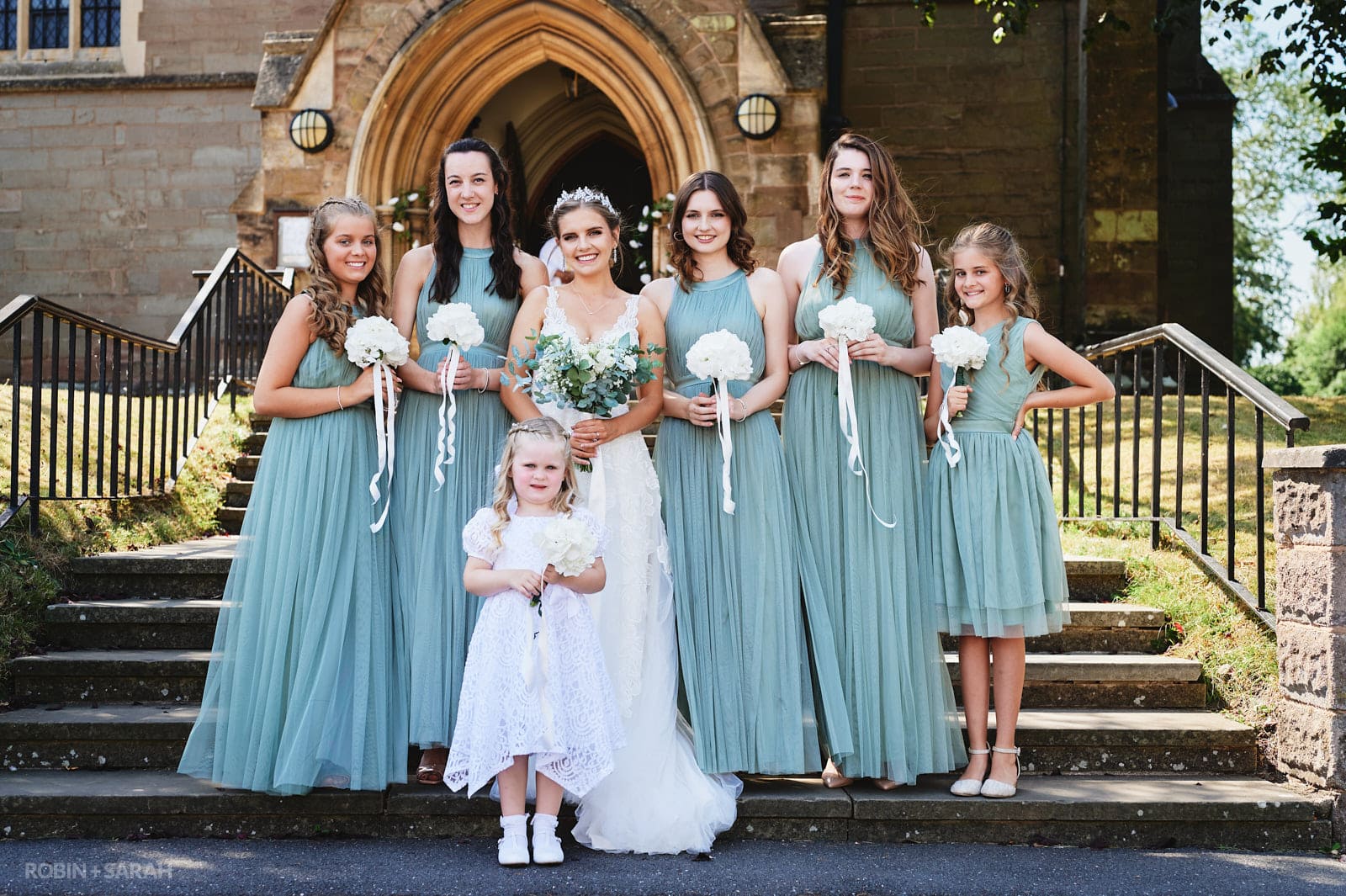 Group photo of bride and bridesmaids at St Peter's RC church Bromsgrove