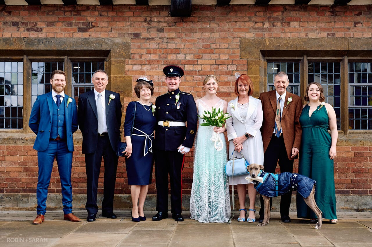 Group photo of wedding party outside The Henley Room in Stratford-upon-Avon