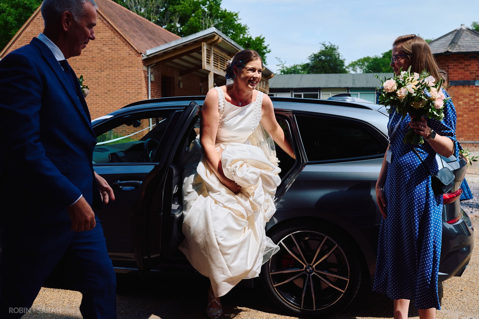 Bride arrives at Avoncroft Museum wedding ceremony.