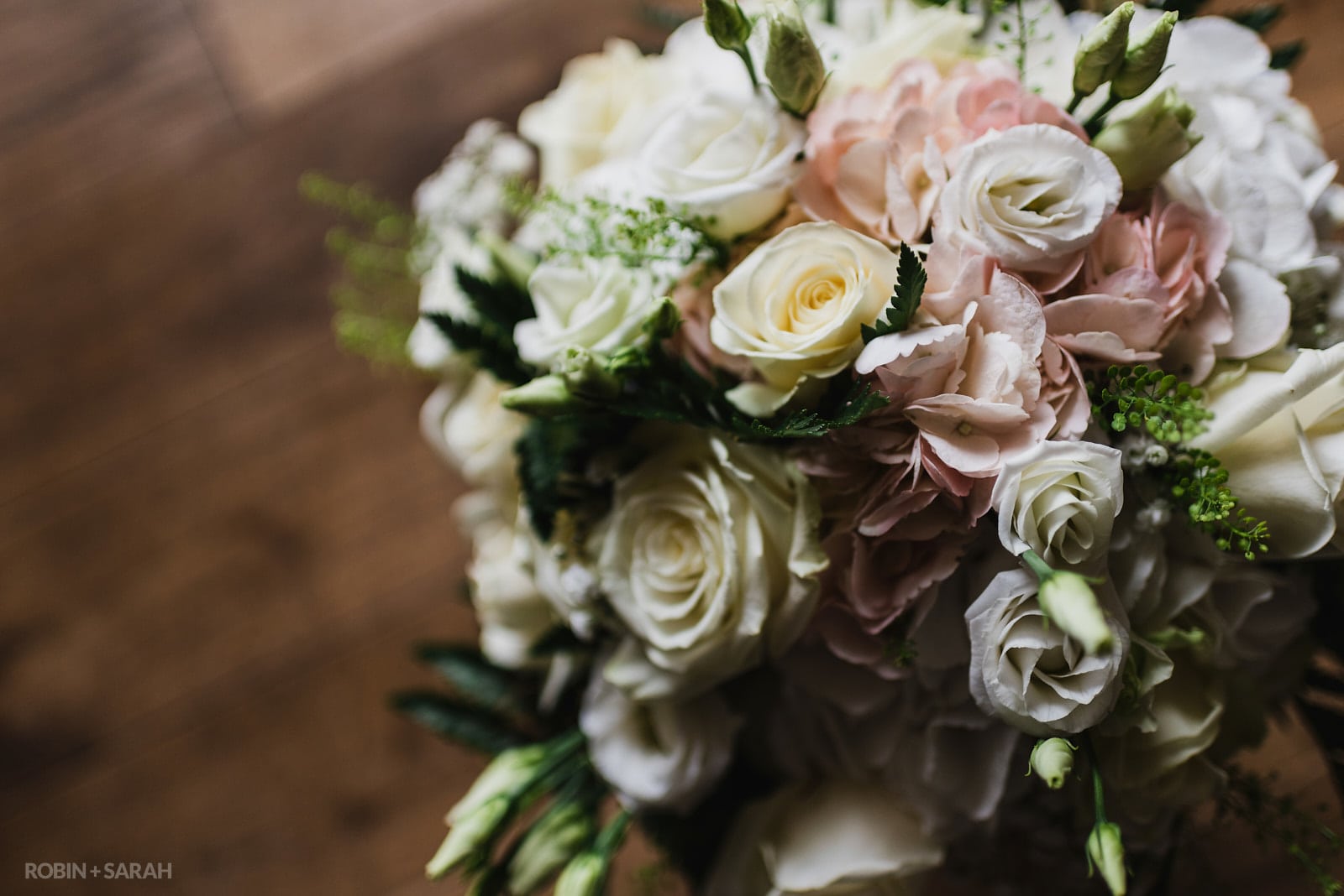 Bridal bouquet with pink, white and ivory flowers