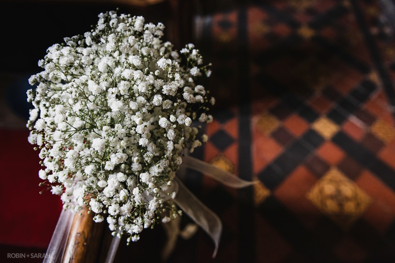 Bouquet of wedding flowers in church
