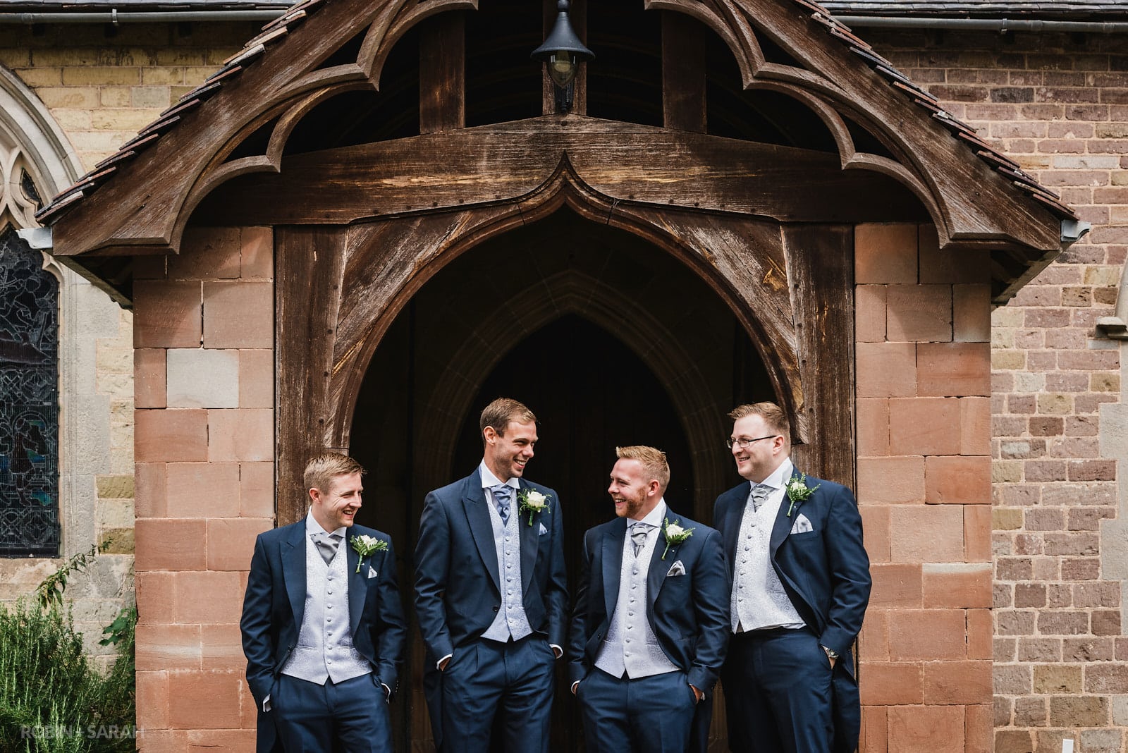 Groom and groomsmen group photo at St Peter's Church Diddlebury