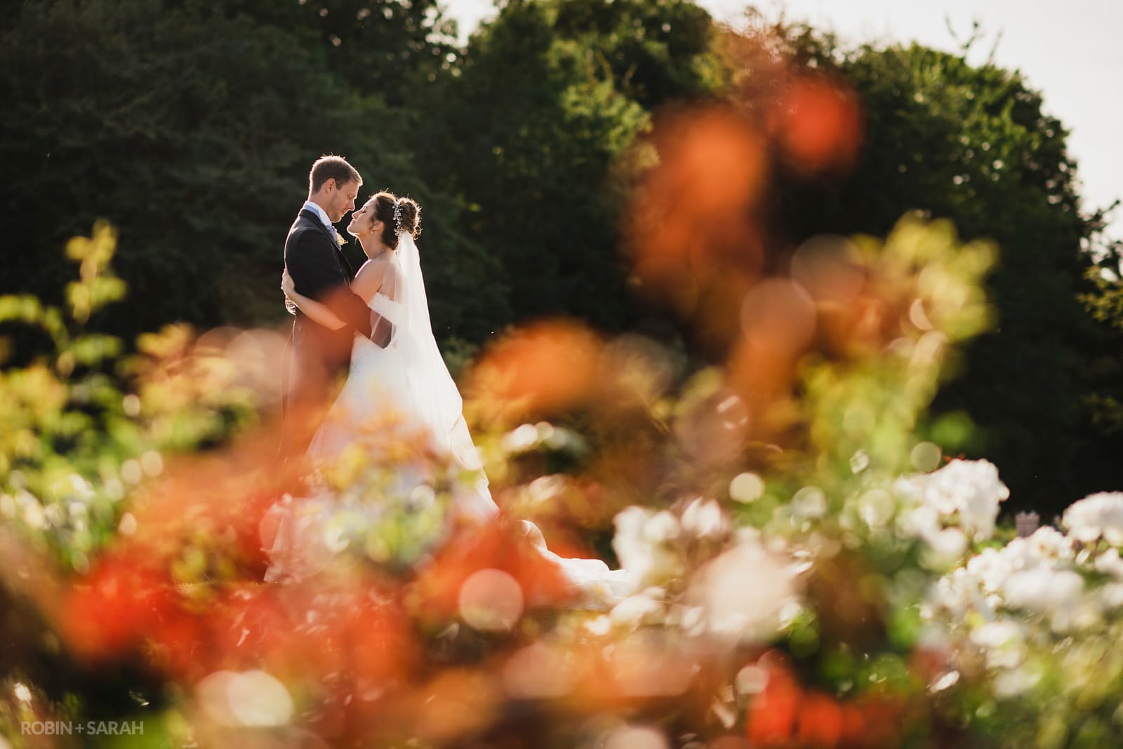 Bride and groom in beautiful grounds