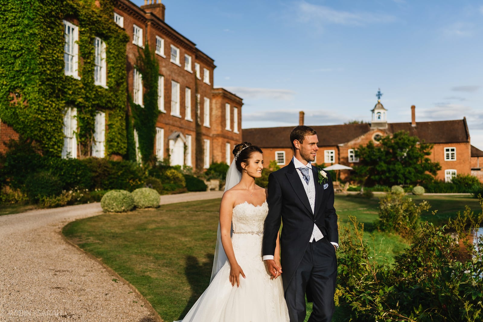 Bride and groom at Delbury Hall in beautiful evening light
