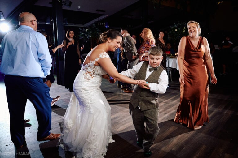 Bride friends dancing