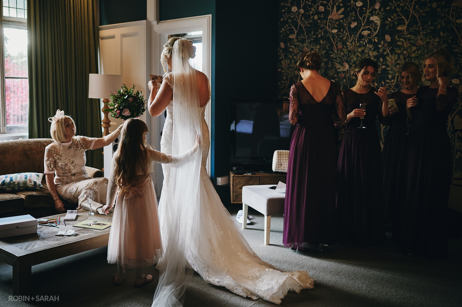 Bride and bridesmaids prepare for wedding at Hampton Manor