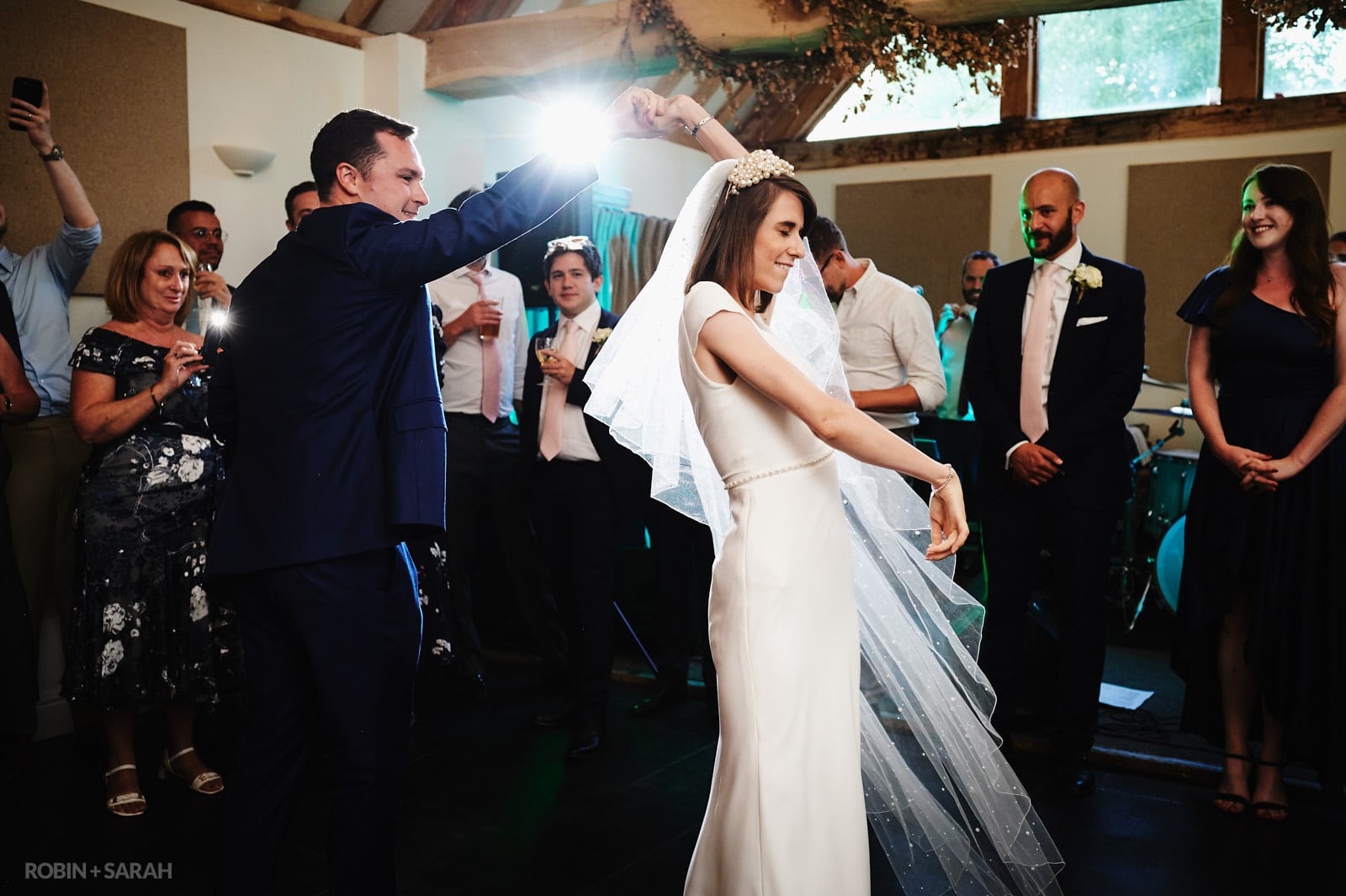 Bride and groom's first dance in barn at Wethele Manor