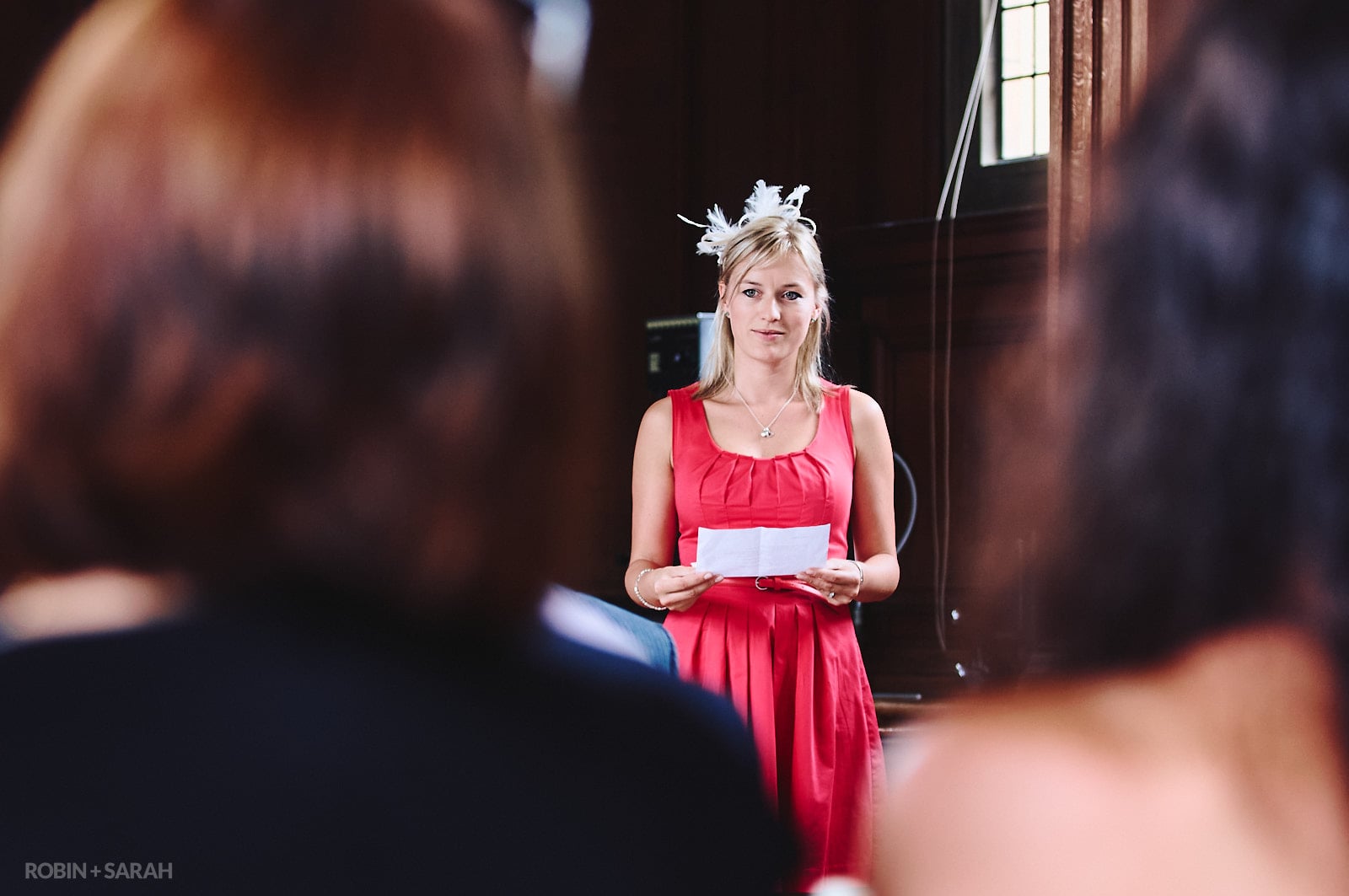 Wedding guest gives reading during ceremony