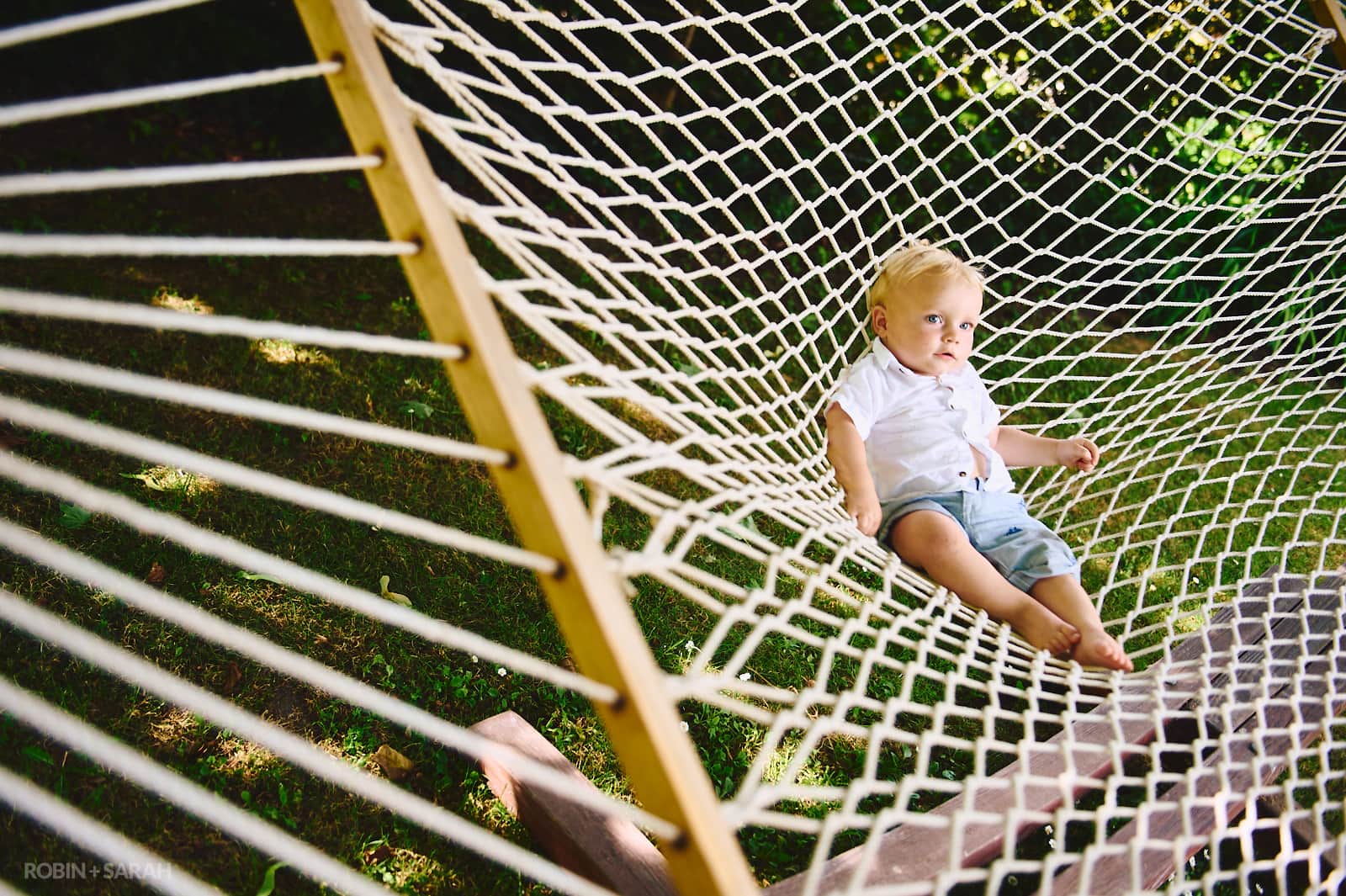Toddler on rope hammock