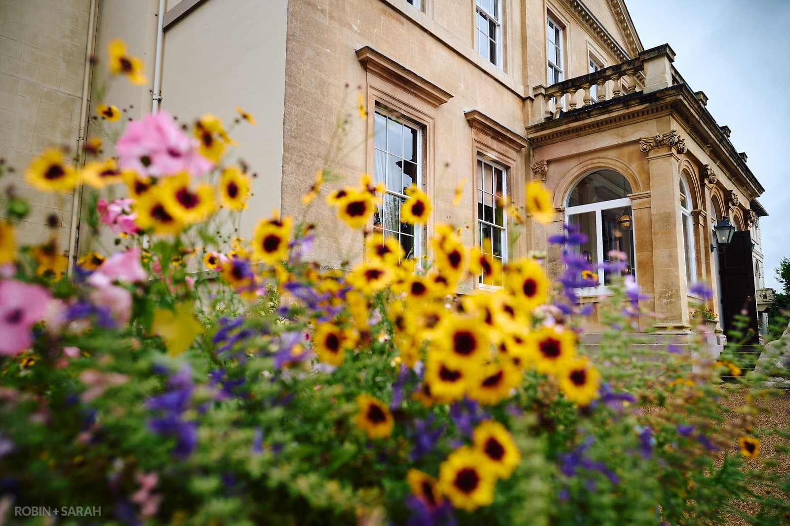 Front of Spring Grove House with flowers in foreground
