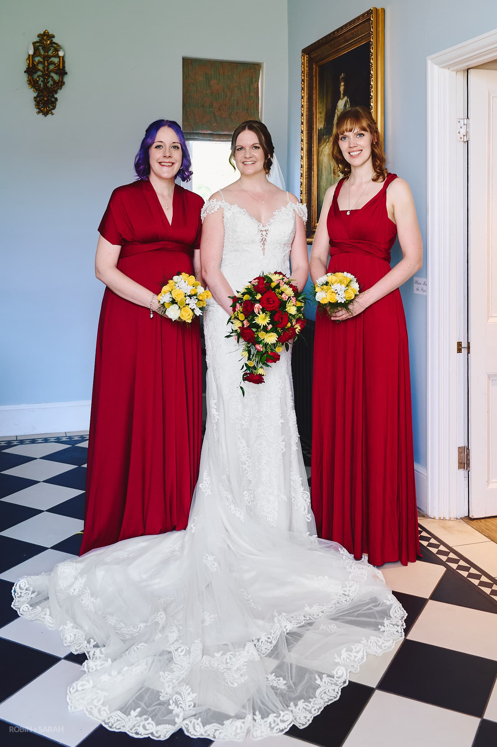 Wedding group photo of bride and two bridesmaids at Stanbrook Abbey