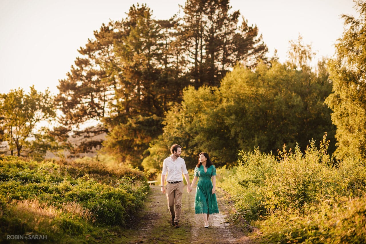 Couple walking on hilltop location in Bromsgrove