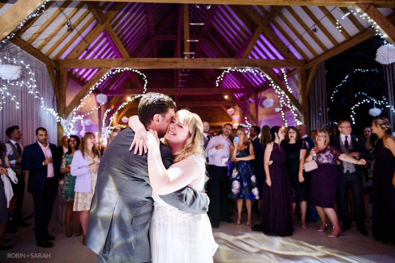 Bride and groom's first dance at their wedding at Redhouse Barn