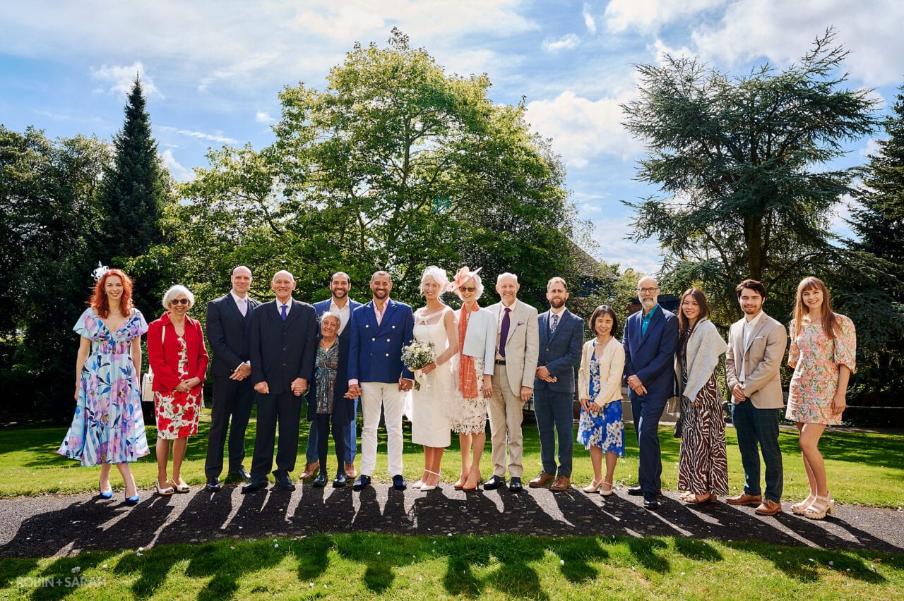 Wedding group photo outside The Elgar Room in Malvern