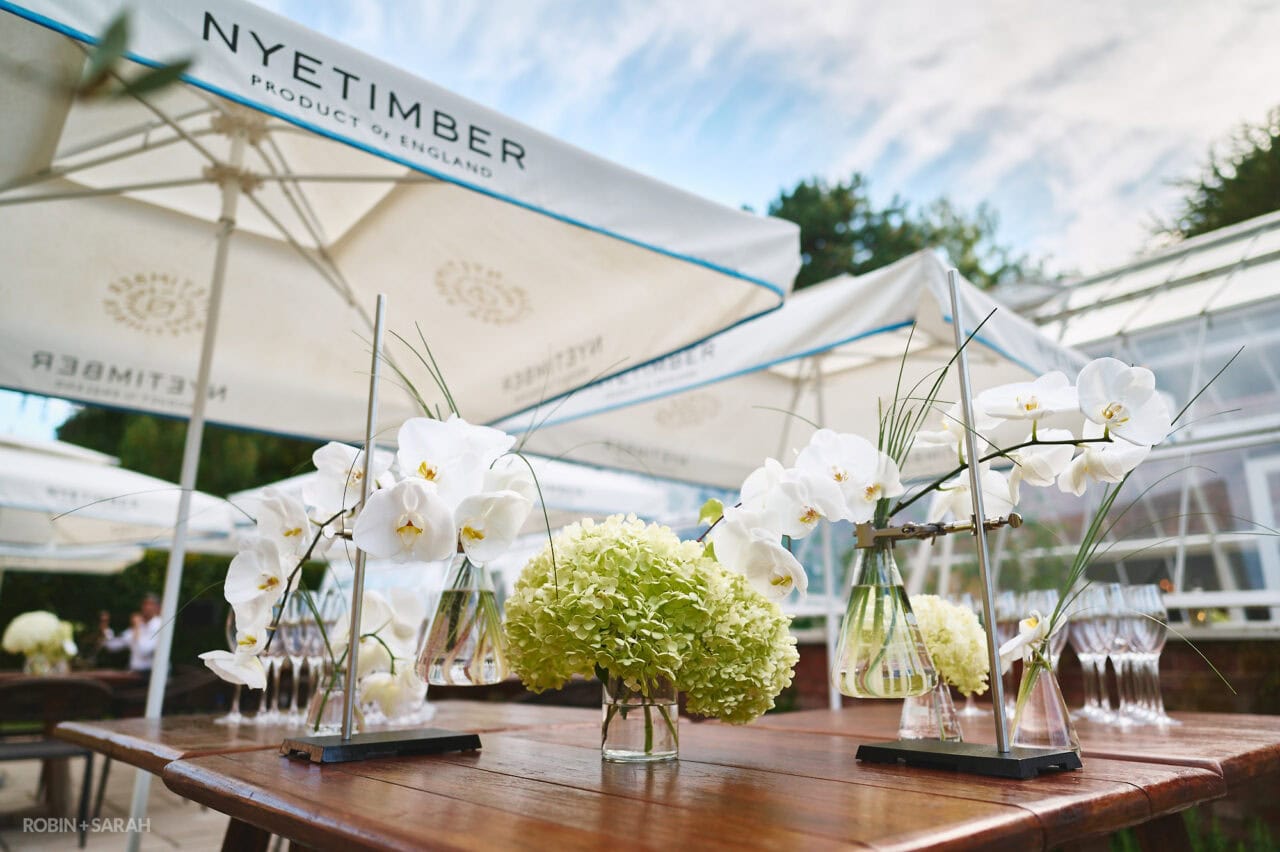 White flowers on wooden tables