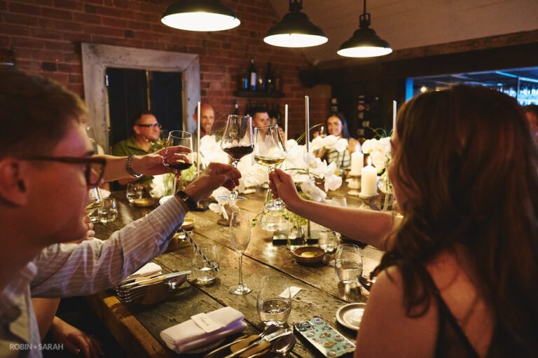 Guests raise a toast during speeches
