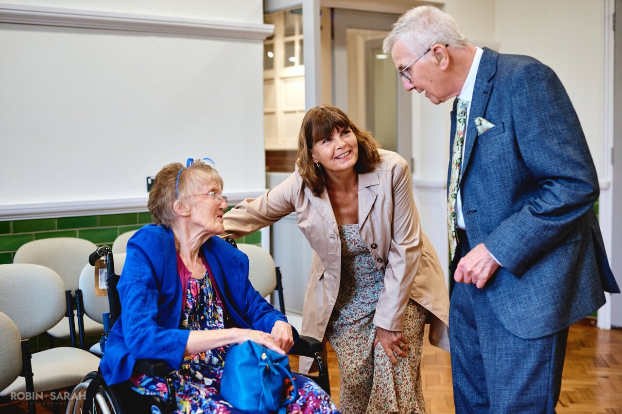 Guests chat and relax as they at Registry Office before wedding ceremony