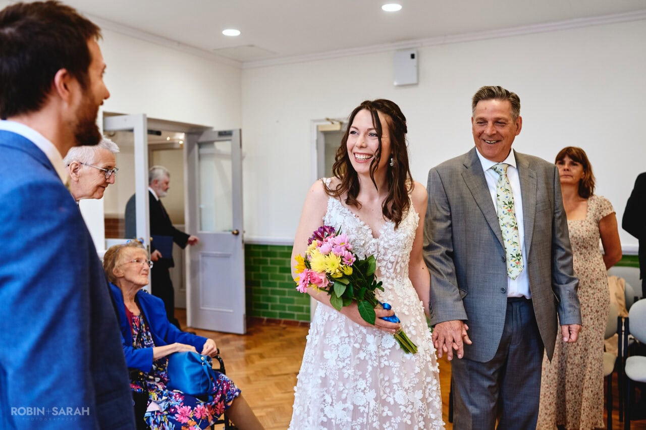 Bride and dad enter wedding ceremony at Bromsgrove Registry Office